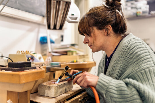 Woman Making Handmade Jewelry