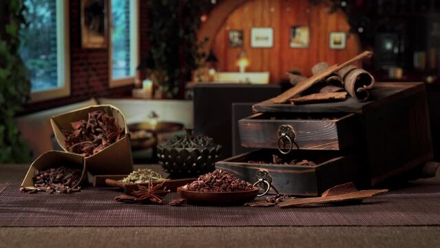 Chinese traditional seasoning five spice powder and raw materials on retro background