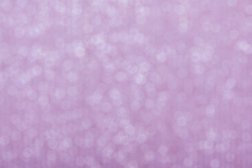 Pink bokeh circle abstract shining background. Blurred glittering wallpaper.