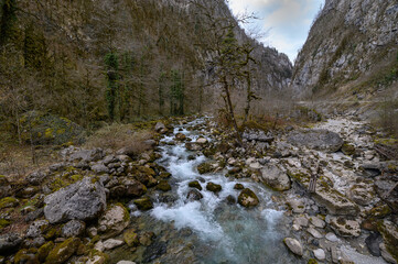 Mountain road with steep cliffs. Beautiful road landscape