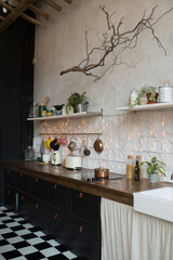 Fototapeta na wymiar The interior of the kitchen in a modern Scandinavian style