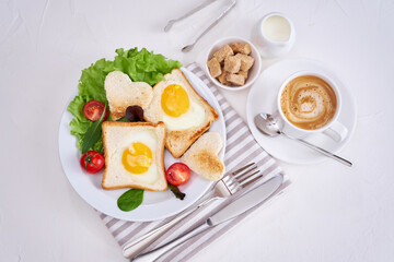 Fried Egg on Toast Bread and cup of fresh hot coffee on light grey background