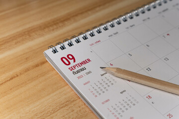 Sep month 2022 Calendar page with pencil business planning concept on wooden background
