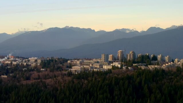 SFU Burnaby Campus On Deep Woodland Around Burnaby Height In British Columbia, Canada. Aerial Wide Shot