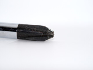 Tip of a Phillips screwdriver