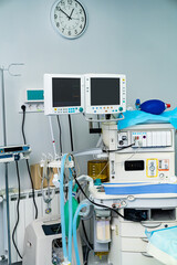 Surgery professional equipment in light sterile room. Modern hospital devices for surgery.