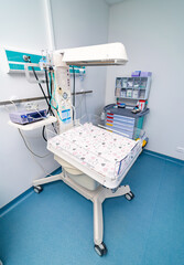 Empty maternity room interior. Newborn healthcare modern hospital ward.
