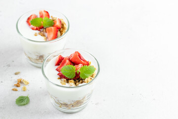Summer berry granola greek yogurt dessert. Top view, copy space,flat lay.