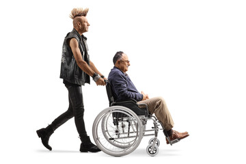 Obraz premium Punk pushing a mature man in a wheelchair
