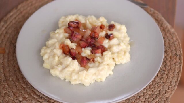 Ready To Eat Slovak Food In A Plate. Bryndzove Halusky. close up