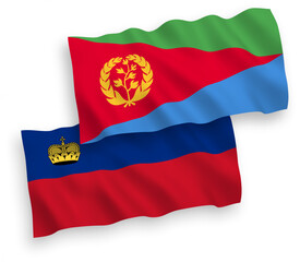 National vector fabric wave flags of Liechtenstein and Eritrea isolated on white background. 1 to 2 proportion.