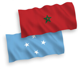 National vector fabric wave flags of Federated States of Micronesia and Morocco isolated on white background. 1 to 2 proportion.