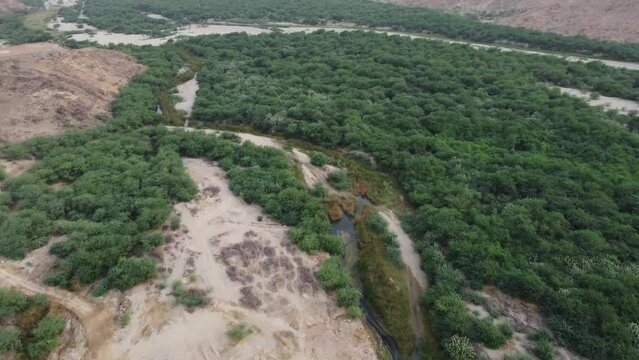 Aerial flying forward over Hot Spring Al Lith  at daytime, Saudi Arabia