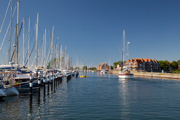 Fototapeta na wymiar Port of Orth with sailingboats Fehmarn Island, Baltic Sea, Schleswig-Holstein, Germany, Europe