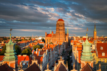 Beautiful architecture of the Main Town of Gdansk in the rays of the setting sun. Poland