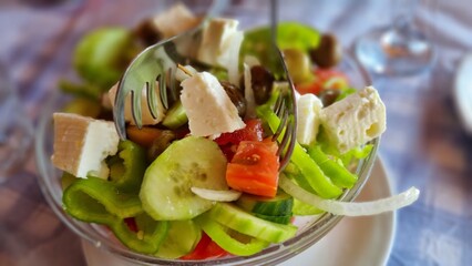 Greek salad with tomatoes, cucumbers and cheese