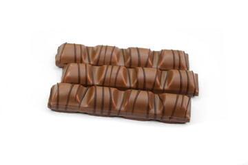 Chocolate Bar with soft hazelnut filling isolated on white background.