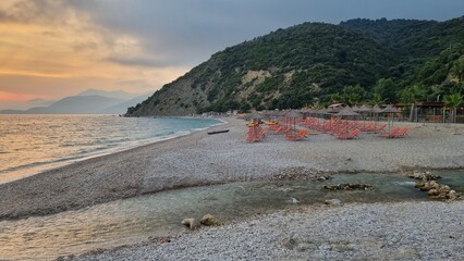 view of the beach at sunset in Albania