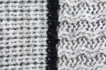 Macro knitted flat lay texture background. Close up pattern. Wool sweater macro detail.