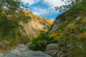 Beautiful landscape of the Caucasus mountains, a trail in a mountain gorge on an autumn sunny day, Georgia