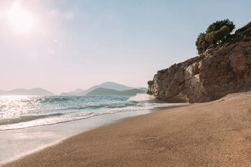 Landscape of Kidrak beach at sunset. Coast in Oludeniz, Mugla region in Turkey on summer day. Travel destination