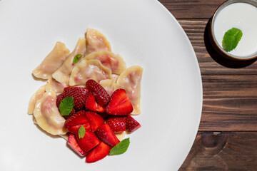 Dumplings with strawberries and mint