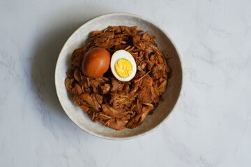 a plate of gudeg, traditional food from Yogyakarta, Indonesia