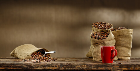 Coffee in sacks and wall with shadows. 