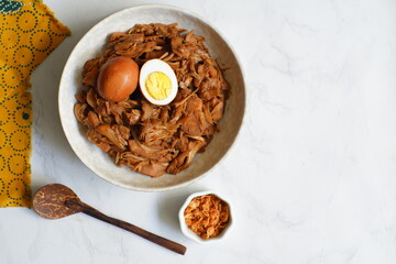 a plate of gudeg, traditional food from Yogyakarta, Indonesia