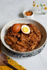 a plate of gudeg, traditional food from Yogyakarta, Indonesia