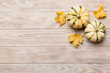 Autumn composition. Pattern made of dried leaves and other design accessories on table. Flat lay, top view