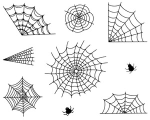 a set of scary cobwebs with spiders on a white background. Vector