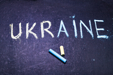 Inscription blue-yellow with chalk Ukraine