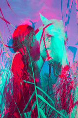 Colored Double exposure picture of a young woman and a white horse