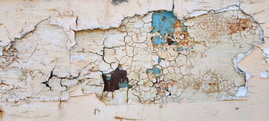 Old plaster on the wall. Abstract background with texture. Banner.
