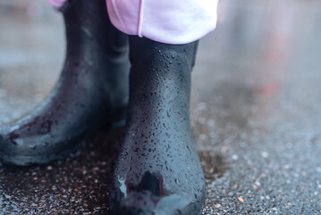 Close up of galoshes on a rainy day