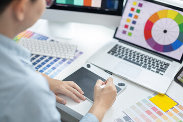 Professional development programmers are choosing color schemes to decorate their website or application to be attractive, Write information or code for the website,  HTML, Javascript, Color tone.