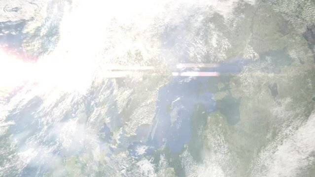 Earth zoom in from outer space to city. Zooming on Nykoping, Sweden. The animation continues by zoom out through clouds and atmosphere into space. Images from NASA