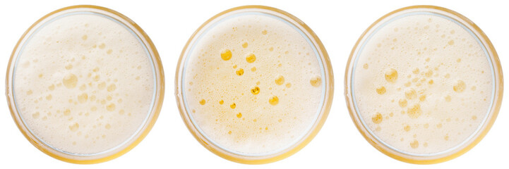 beer bubbles in Glass of light beer top view collection isolated on white, macro