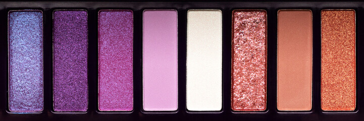 Colorful eye shadow palette background banner. Color eyeshadow palette. Wide panoramic header