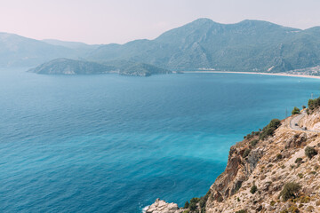 Aerial view of seascape in Oludeniz, Turkey. Sea and Mountains around turquoise water.