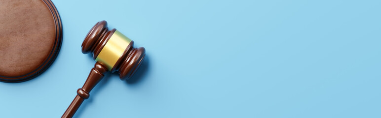 Judge's Gavel on Blue Background with Copy Space