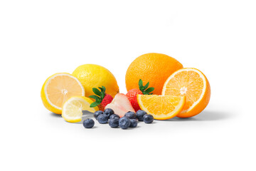 Heap of different fruits and berries Orange, lemon, strawberry and blueberry isolated on white background.
