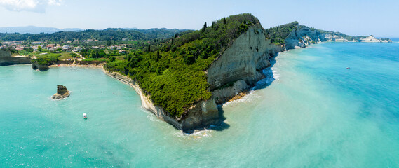 Aerial view of the cliff overlooking the sea near Apotripiti beach and of Mermaid's rock, a...