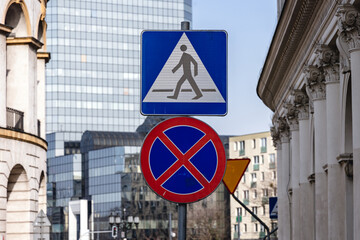 Pedestrian crossing and No stopping road signs in Warsaw city, Poland