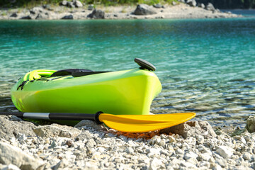 Touring Kayak on a Rocky Lake Shore