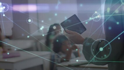 Animation of network of connections and light trails over diverse schoolchildren and teacher - Powered by Adobe