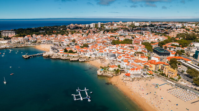 Aerial view of Conceicao and Duquesa beaches in Cascais, Portugal during a summer day