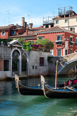 Fototapeta na wymiar Venice - ancient beautiful romantic and tourist attraction italian city with canals and gondolas