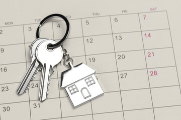 Calendar and a bunch of keys with a house keychain